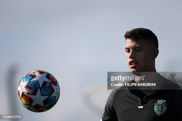 Sporting Lisbon's Portuguese midfielder Matheus Nunes eyes the ball during a training session at Cristiano Ronaldo Academy training ground in...