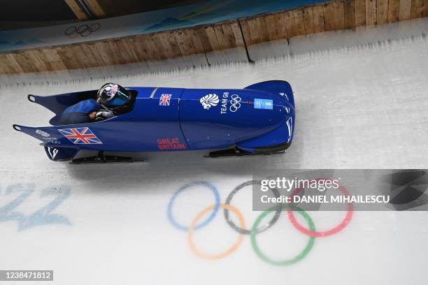 Britain's Brad Hall and Nick Gleeson compete in the 2-man bobsleigh event at the Yanqing National Sliding Centre during the Beijing 2022 Winter...