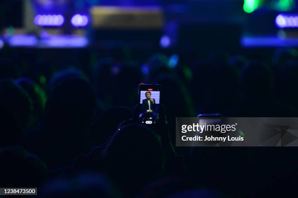 Atmosphere of fans watch legends Jose Luis Rodriguez "El Puma" in concert on they smart phone during 'Dia del Amor y La Amistad' at James L. Knight...