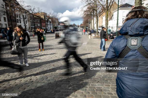 Some people gather at the Sint-Katelijneplein - Place Sainte-Catherine in the city center of Brussels for a protest action against corona-measures...