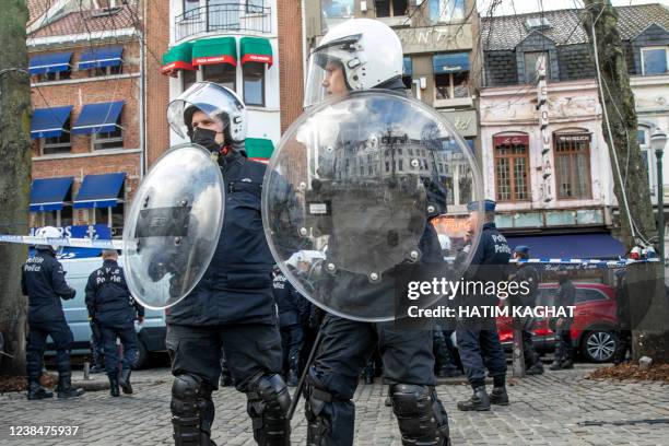 Protestors and riot police face off at the Sint-Katelijneplein - Place Sainte-Catherine in the city center of Brussels, at a protest action against...