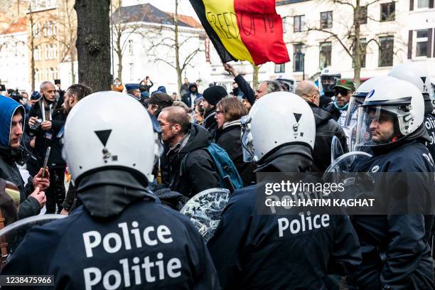 Protestors and riot police face off at the Sint-Katelijneplein - Place Sainte-Catherine in the city center of Brussels, at a protest action against...