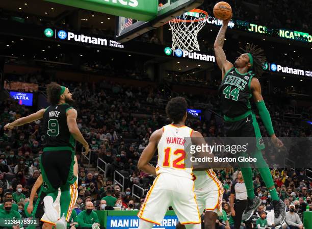 Boston Celtics center Robert Williams III ally oop slam dunk from teammate guard Derrick White against the Atlanta Hawks during second quarter NBA...