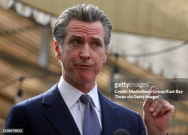 Governor Gavin Newsom speaks at a press conference on Wednesday, Feb. 9 in Oakland, Calif. Newsom signed legislation to extend COVID-19 supplemental...