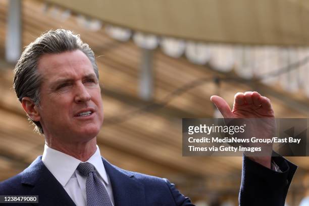Governor Gavin Newsom speaks at a press conference on Wednesday, Feb. 9 in Oakland, Calif. Newsom signed legislation to extend COVID-19 supplemental...