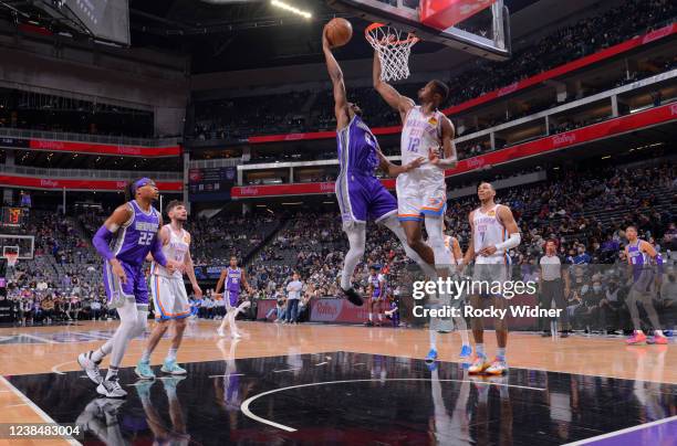 Maurice Harkless of the Sacramento Kings dunks against Mamadi Diakite of the Oklahoma City Thunder on February 5, 2022 at Golden 1 Center in...