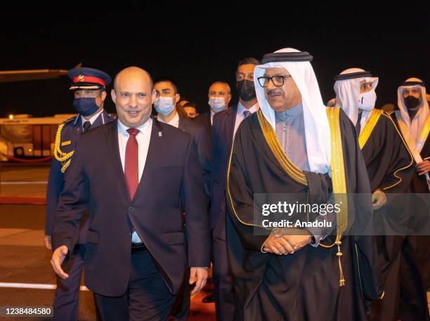 Israeli Prime Minister Naftali Bennett is welcomed by Minister of Foreign Affairs of Bahrain Abdullatif bin Rashid Al Zayani at Bahrain International...