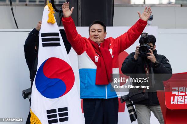 Yoon Suk-yeol, presidential candidate from the main opposition People Power Party, reacts during a campaign rally in Seoul, South Korea, on Tuesday,...