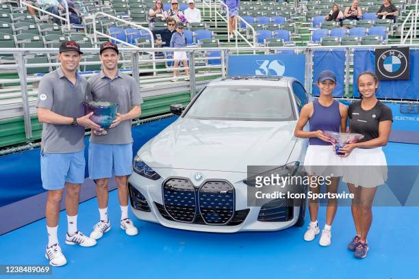 Bob Bryan , Mike Bryan , Bianca Fernandez and Leylah Fernandez pose together after an exhibition match at the ATP Delray Beach Open on February 13 at...