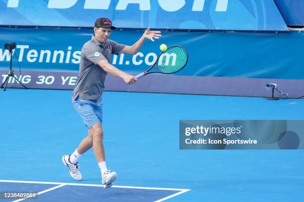 Mike Bryan competes during an exhibition match at the ATP Delray Beach Open on February 13 at the Delray Beach Stadium & Tennis Center in Delray...