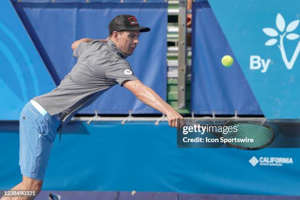 Mike Bryan competes during an exhibition match at the ATP Delray Beach Open on February 13 at the Delray Beach Stadium & Tennis Center in Delray...