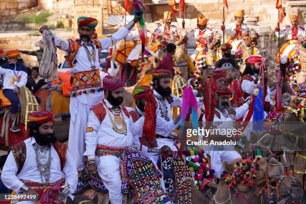 Rajasthani artists wearing traditional costumes take part in the Desert Festival Celebrations in Jaisalmer, Rajasthan, India on February 14, 2022.