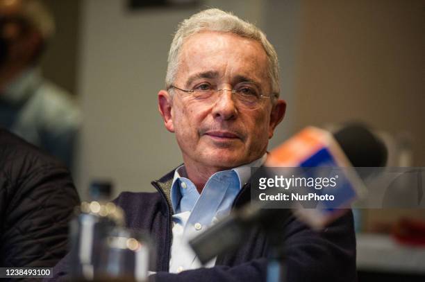 Colombia's former president Alvaro Uribe Velez and political leader of the political party 'Centro Democratico' talks during a press conference of...