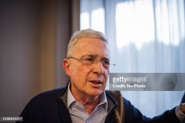 Colombia's former president Alvaro Uribe Velez and political leader of the political party 'Centro Democratico' talks during a press conference of...