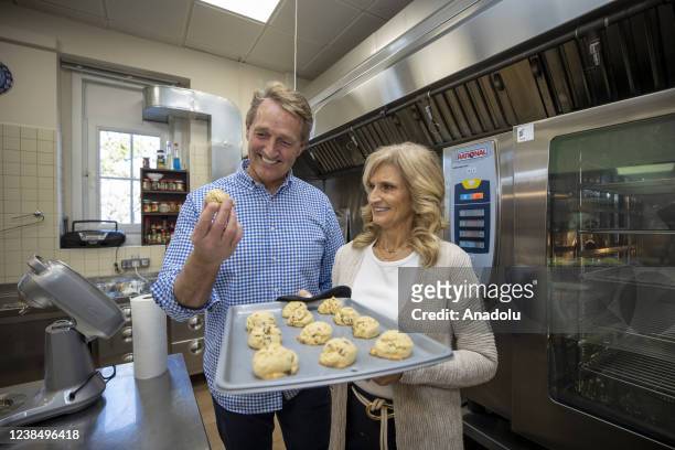 Ambassador to Turkiye Jeffry Flake and his wife Cheryl Flake prepare chocolate chip cookie together during an interview in their residence in Ankara,...