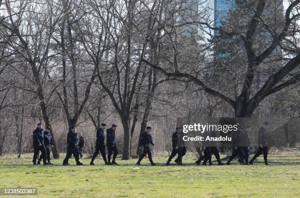 Police officers take security measures as a group of environmental activist gather to protest to draw attention on air pollution continues to...