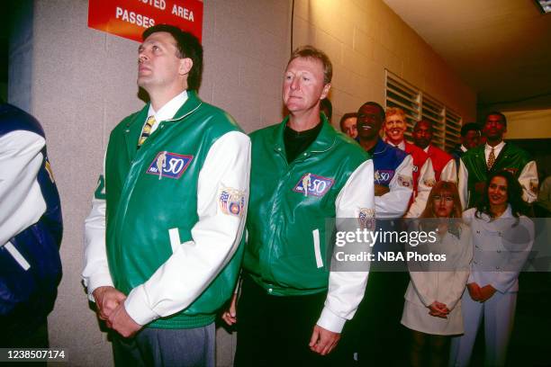 Former Boston Celtics greats Kevin McHale and Larry Bird wait to enter the court as the NBA celebrates the naming of the 50 greatest players during...