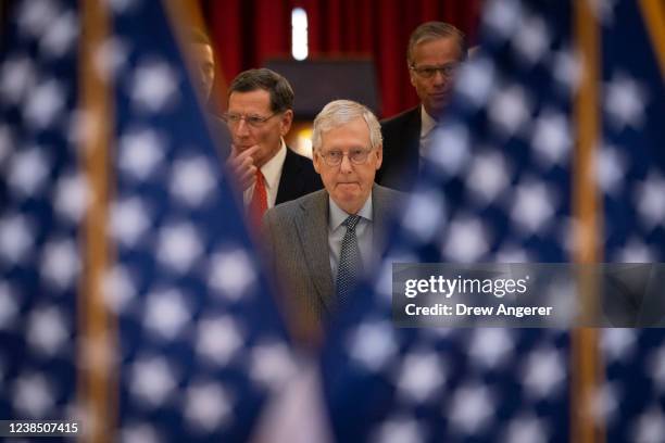 Senate Minority Leader Mitch McConnell leaves a lunch meeting with Senate Republicans on Capitol Hill February 15, 2022 in Washington, DC. McConnell...