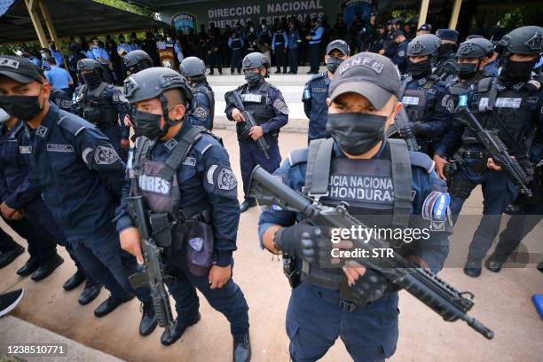 Members of the police special forces stand at the headquarters of the Honduras Police in Tegucigalpa, on February 15, 2022. - The United States has...