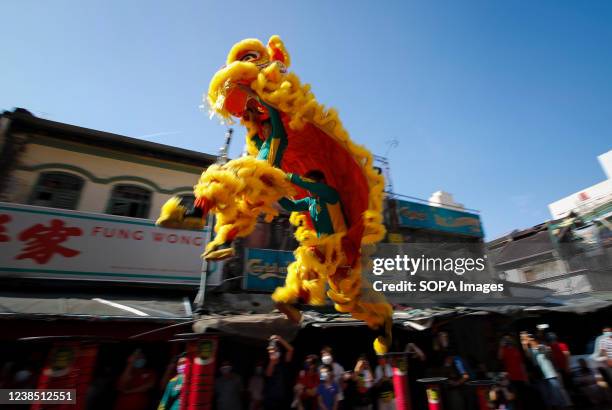 Lion dance troupe performing during the Chap Goh Mei celebrations. 15th night of Chinese New Year in Hokkien of Lunar New Year, is also known as Yuan...