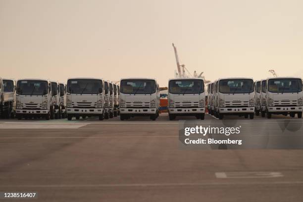 Isuzu Motors Ltd. Trucks bound for shipment stand at a port in Yokohama, Japan, on Monday, Feb. 14, 2022. Japan is scheduled to release trade balance...