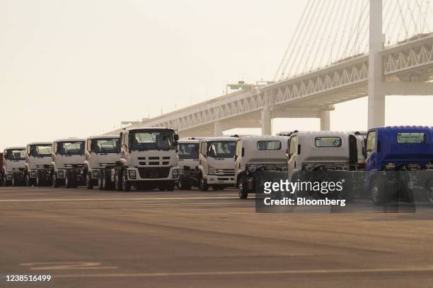 Isuzu Motors Ltd. Trucks bound for shipment parked at a port in Yokohama, Japan, on Monday, Feb. 14, 2022. Japan is scheduled to release trade...