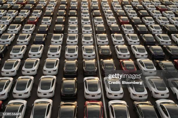 Tesla Inc. Vehicles in a parking lot after arriving at a port in Yokohama, Japan, on Monday, Feb. 14, 2022. Japan is scheduled to release trade...