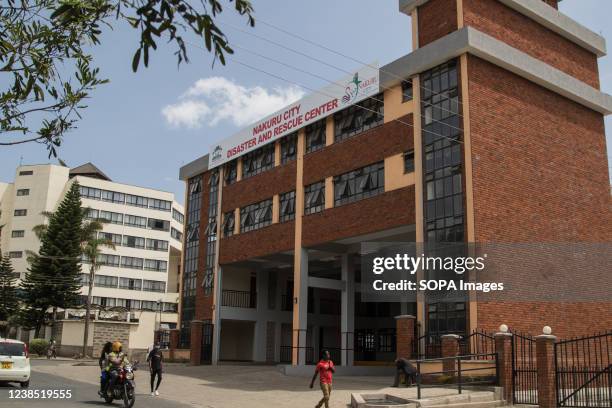 People seen walking past Nakuru City Disaster and Rescue Center. Nakuru municipality was upgraded to city status by President Uhuru Kenyatta having...