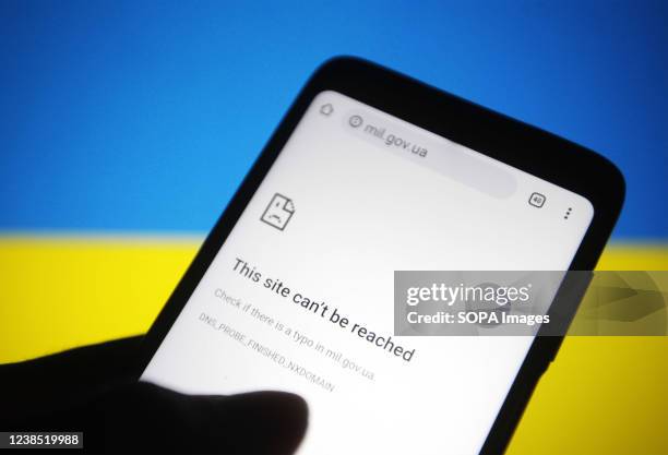 In this photo illustration, a This site can't be reached message is seen on Ministry of Defence of Ukraine official webpage displayed on a smartphone...