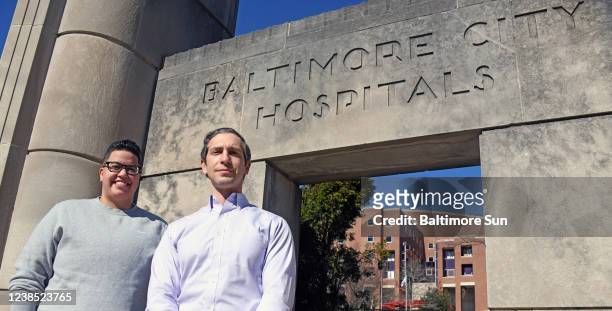 From left, Kels Rosario, of Germantown, and Dr. Panagis Galiatsatos, his post-COVID-19 physician, outside Johns Hopkins Bayview Medical Center, Feb....