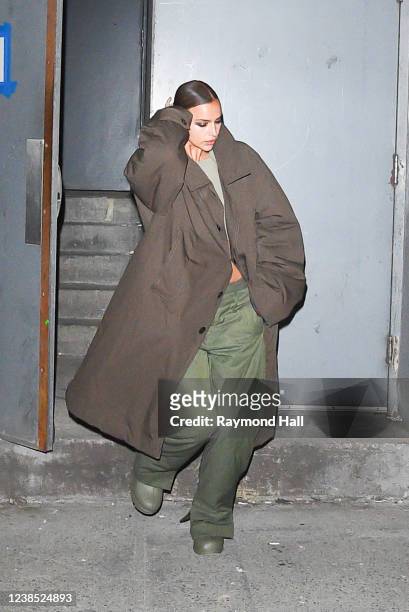 Irina Shayk is seen leaving at the Michael Kors fashion show on February 15, 2022 in New York City.