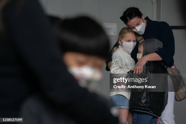 Children and parents line up to receive BioNTech COVID-19 vaccine at Hong Kong Children's Hospital on February 16, 2022 in Hong Kong, China. Hong...