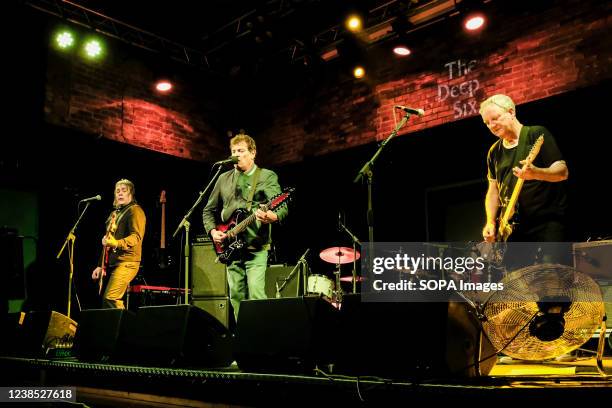 Mick Couch on bass guitar, Mark Syd McGouden, vocals and guitar, and Simon Stebbing, guitar with British mod revival supergroup The Deep Six...