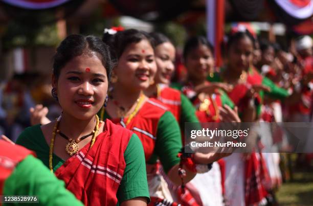 Mising tribal women dancing as they are celebrating Ali-Aye-Ligang festival in Guwahati, Assam, India on 16 February 2022. Ali-Aye-Ligang, the main...