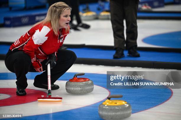 Canadas Jennifer Jones guides her team during the womens round robin session 11 game of the Beijing 2022 Winter Olympic Games curling competition...