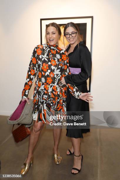 Yasmin Le Bon and Amber Le Bon attend a private view of photographer Dave Benett's new exhibition "Great Shot, Kid" in partnership with Perrier Jouet...