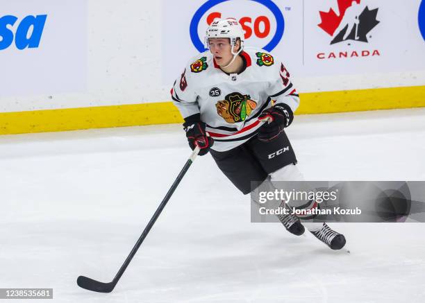 Henrik Borgstrom of the Chicago Blackhawks keeps an eye on the play during second period action against the Winnipeg Jets at Canada Life Centre on...
