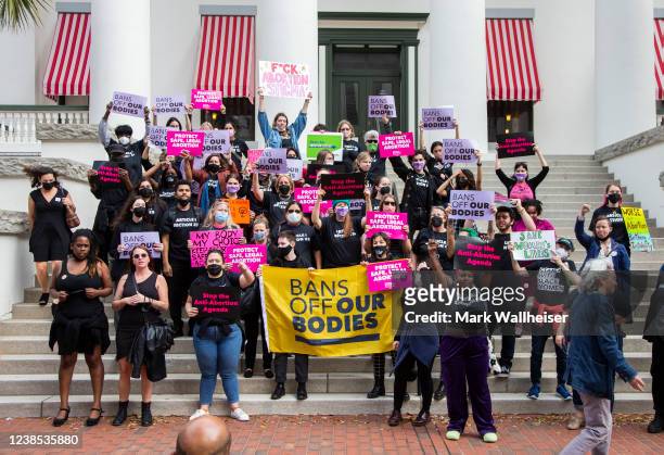 Advocates for bodily autonomy march to the Florida Capitol to protest a bill before the Florida legislature to limit abortions on February 16, 2022...