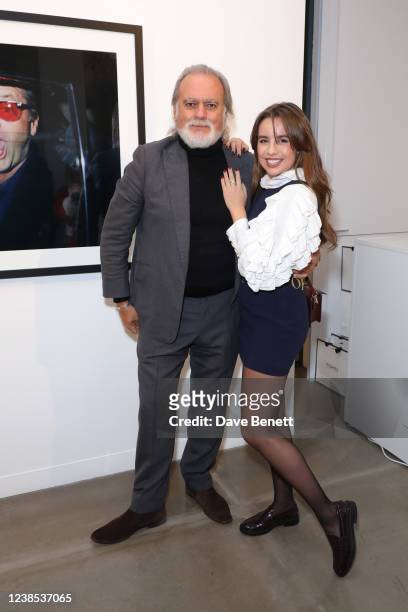 Dave Benett and Annie Doble attend a private view of photographer Dave Benett's new exhibition "Great Shot, Kid" in partnership with Perrier Jouet at...