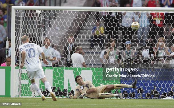 Football World Cup Final, Italy v France, Italian goalkeeper Buffon watches as Zinedine Zidane of France chips the ball from the penalty spot into...