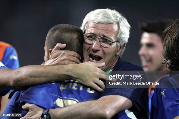 Football World Cup semi-final, Germany v Italy, Italian coach Marcello Lippi hugs Alessandro Del Piero of Italy.