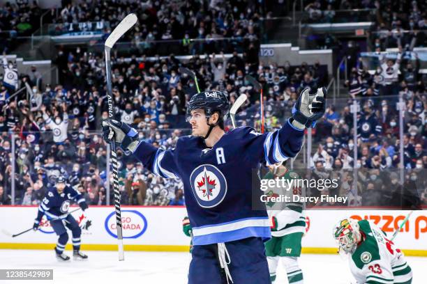 Mark Scheifele of the Winnipeg Jets celebrates after scoring a second period goal against the Minnesota Wild at the Canada Life Centre on February...