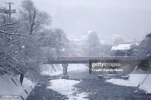 Snow falls in the Gifu Prefecture city of Takayama in central Japan on Feb. 17, 2022.