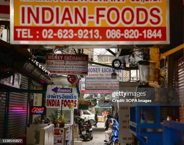 General view of an alley with various shop signs in Little India, Phahurat Market in downtown Bangkok. The area is a 5 minutes walk from Bangkok's...