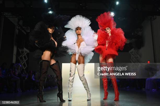 Models walk the runway for The Blonds during New York Fashion Week at Spring Studios on February 16, 2022 in New York City.