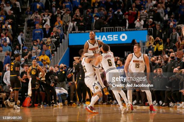 Monte Morris of the Denver Nuggets celebrates a game winning three-point basket during the game against the Golden State Warriors on February 16,...