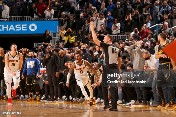 Monte Morris of the Denver Nuggets celebrates a game winning three-point basket during the game against the Golden State Warriors on February 16,...