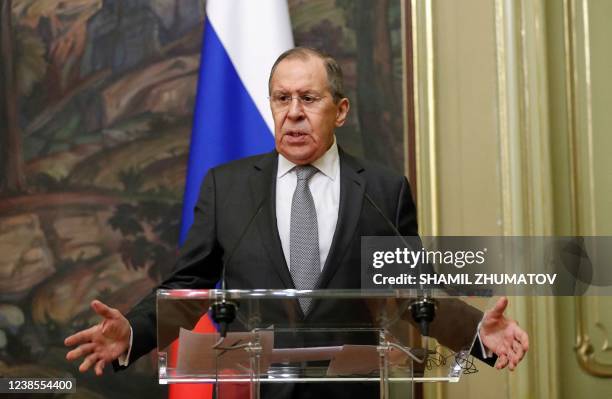 Russian Foreign Minister Sergei Lavrov gestures during a press conference following talks with his Italian counterpart in Moscow, on February 17,...