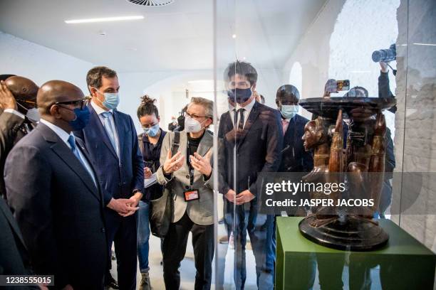 Congo Prime Minister Jean-Michel Sama Lukonde and Prime Minister Alexander De Croo pictured during the presentation of the inventory of museum pieces...