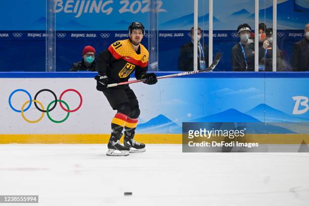Moritz Muller of Germany in action at the men's ice hockey group A preliminary round match between Germany and China during the Beijing 2022 Winter...